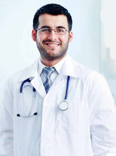 A smiling healthcare professional wearing a lab coat and stethoscope.